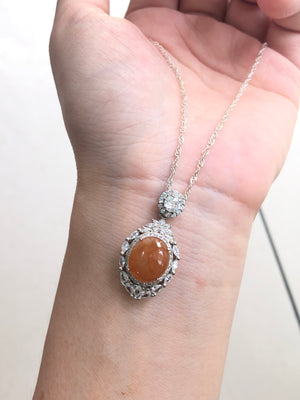 A Blessing in Physical Form**:  
  That small red egg isn’t just carved stone it’s a **quiet promise** of protection, renewal, and courage, carried close to your heart. In many traditions, such pendants are considered *living amulets* absorbing your energy while radiating their own.